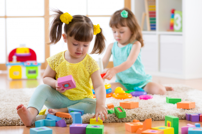 kids playing with colorful block toys